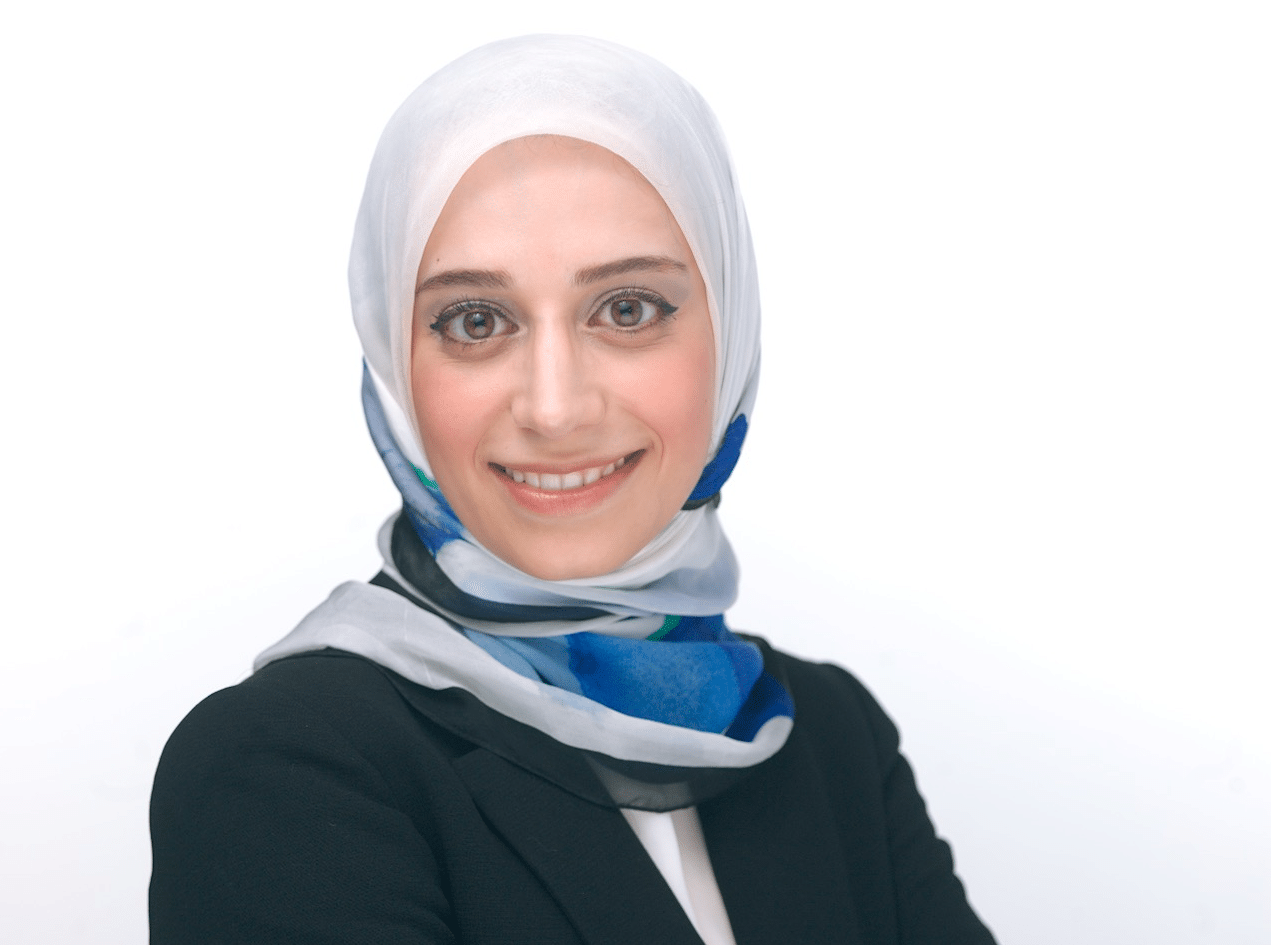 Orthodontist Dr. Noor Obaisi portrait and credentials section at Obaisi Orthodontics in Chicago, IL